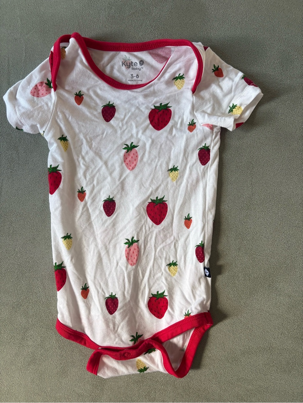 Kyte BABY White Strawberry Print One-Piece with Red Trim